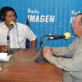 Dr. John Barela on the radio in tatapota peru